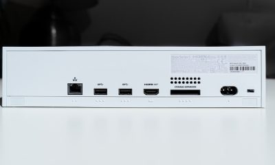 white electronic device turned on in a room