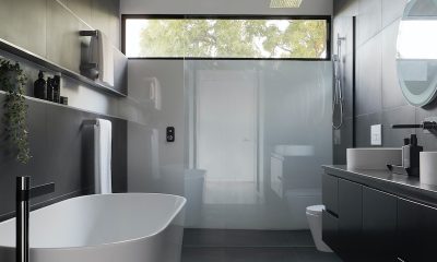 white ceramic bathtub near white bathtub