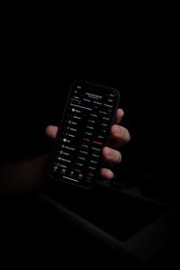 person holding black iphone 5