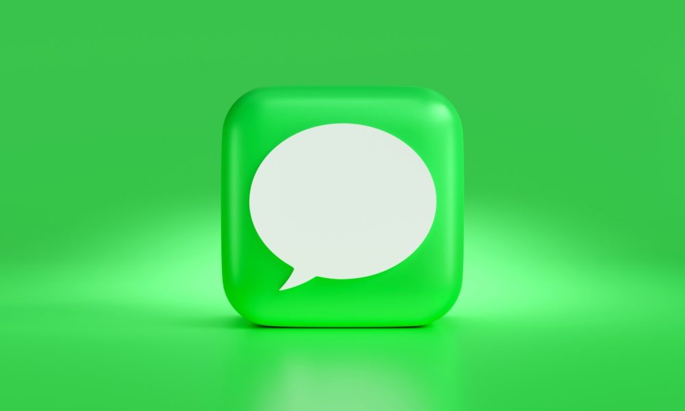 a green square with a white speech bubble