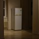 a white refrigerator freezer sitting inside of a kitchen