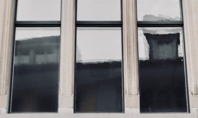 a tall building with a clock on the side of it