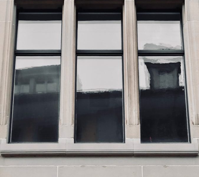 a tall building with a clock on the side of it
