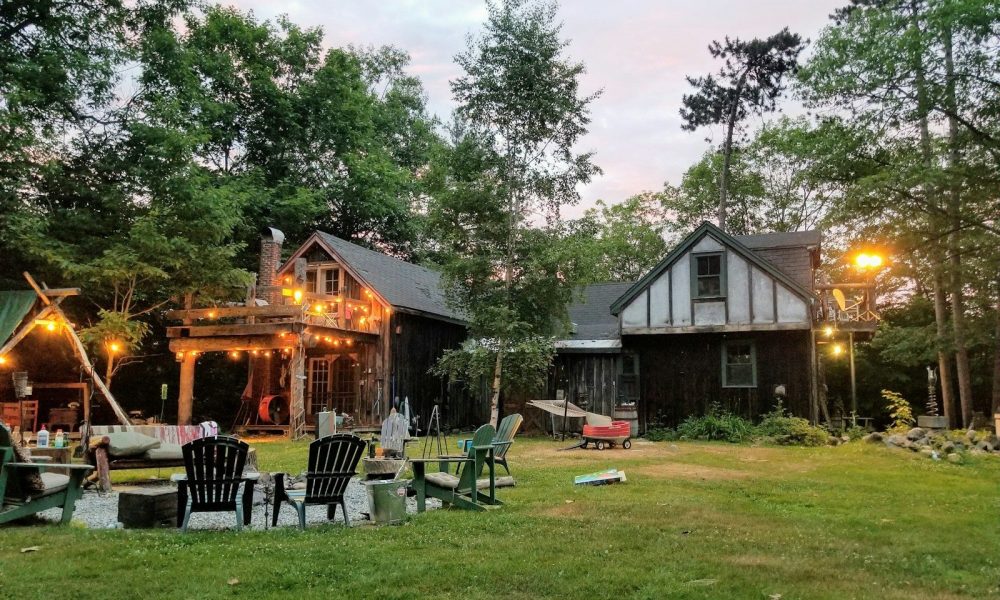 turned-on lights outside houses